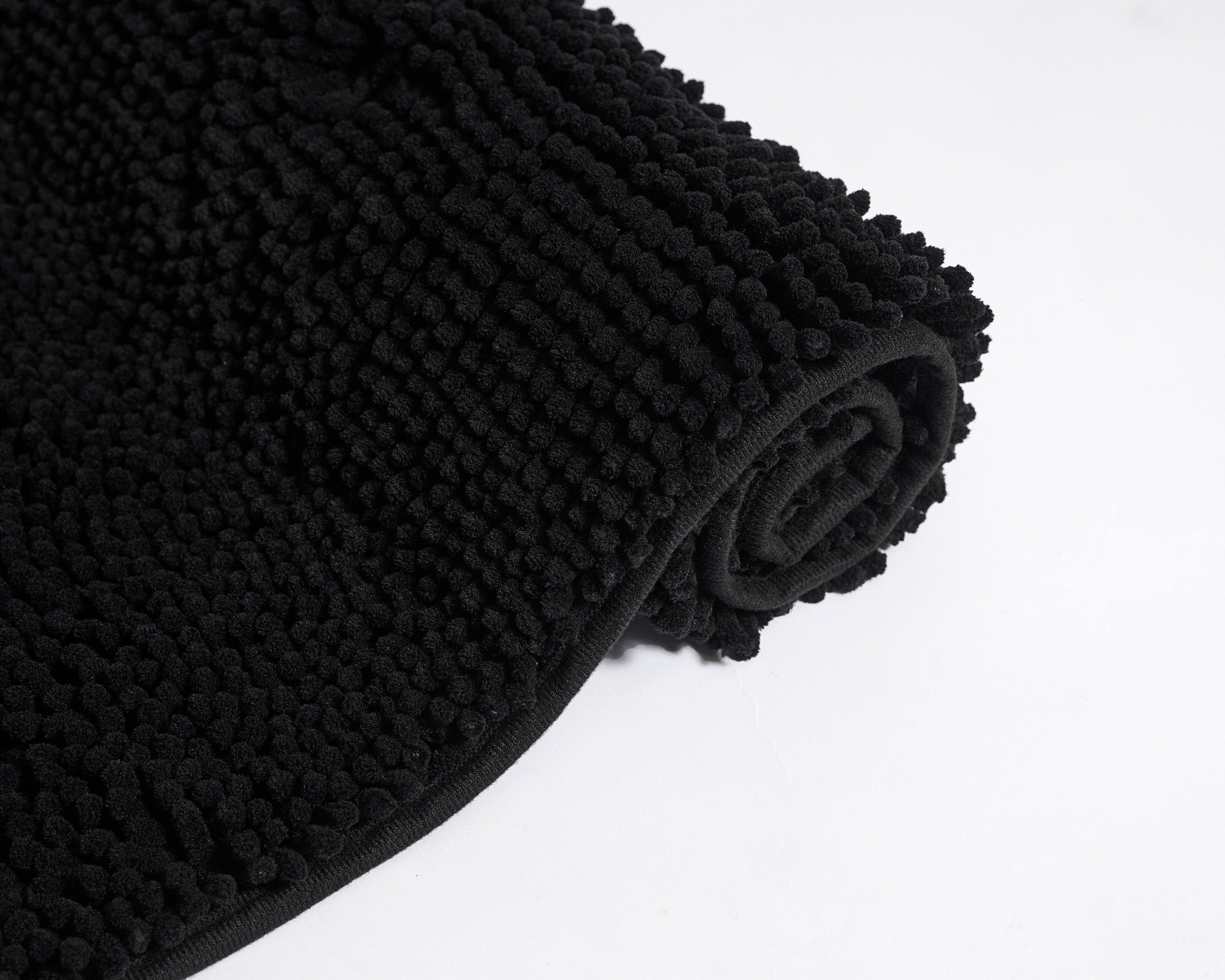 Mily Bath Rug in soft black plush with anti-spill and non-slip features.