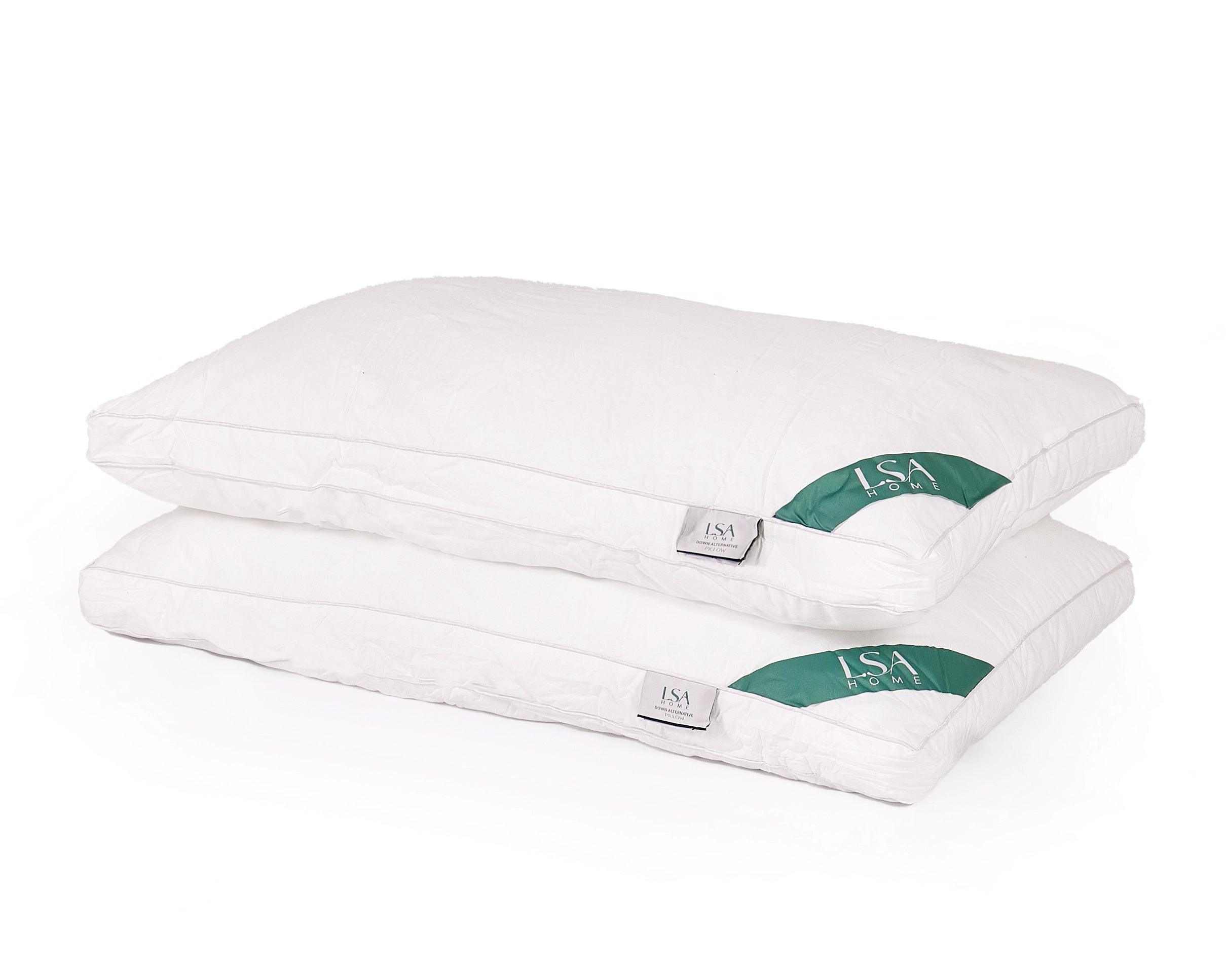 Pair of hypoallergenic down alternative pillows with soft hollow fiber fill.