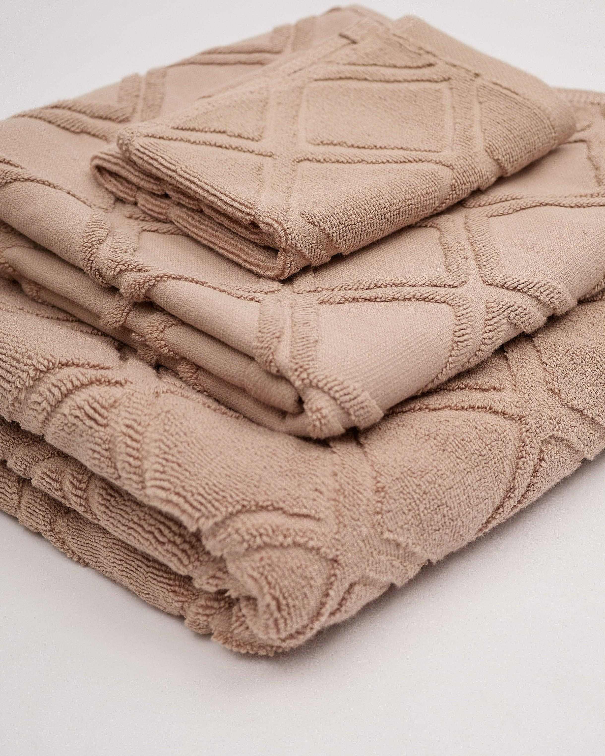 Gris Towel Collection in soft, plush cotton, featuring bath, hand, and face towels.