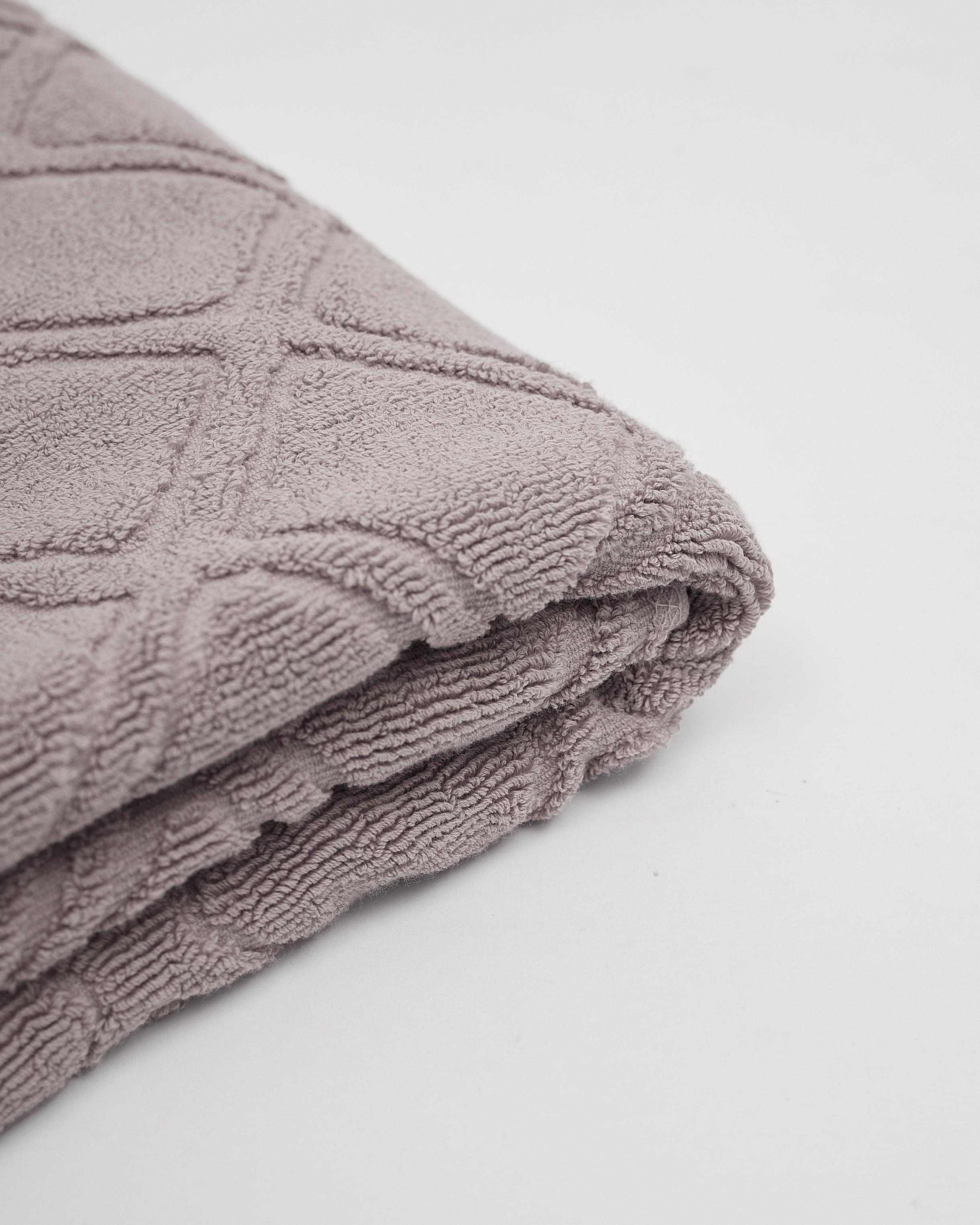 Luxurious Gris Towel Collection with soft, absorbent cotton texture.