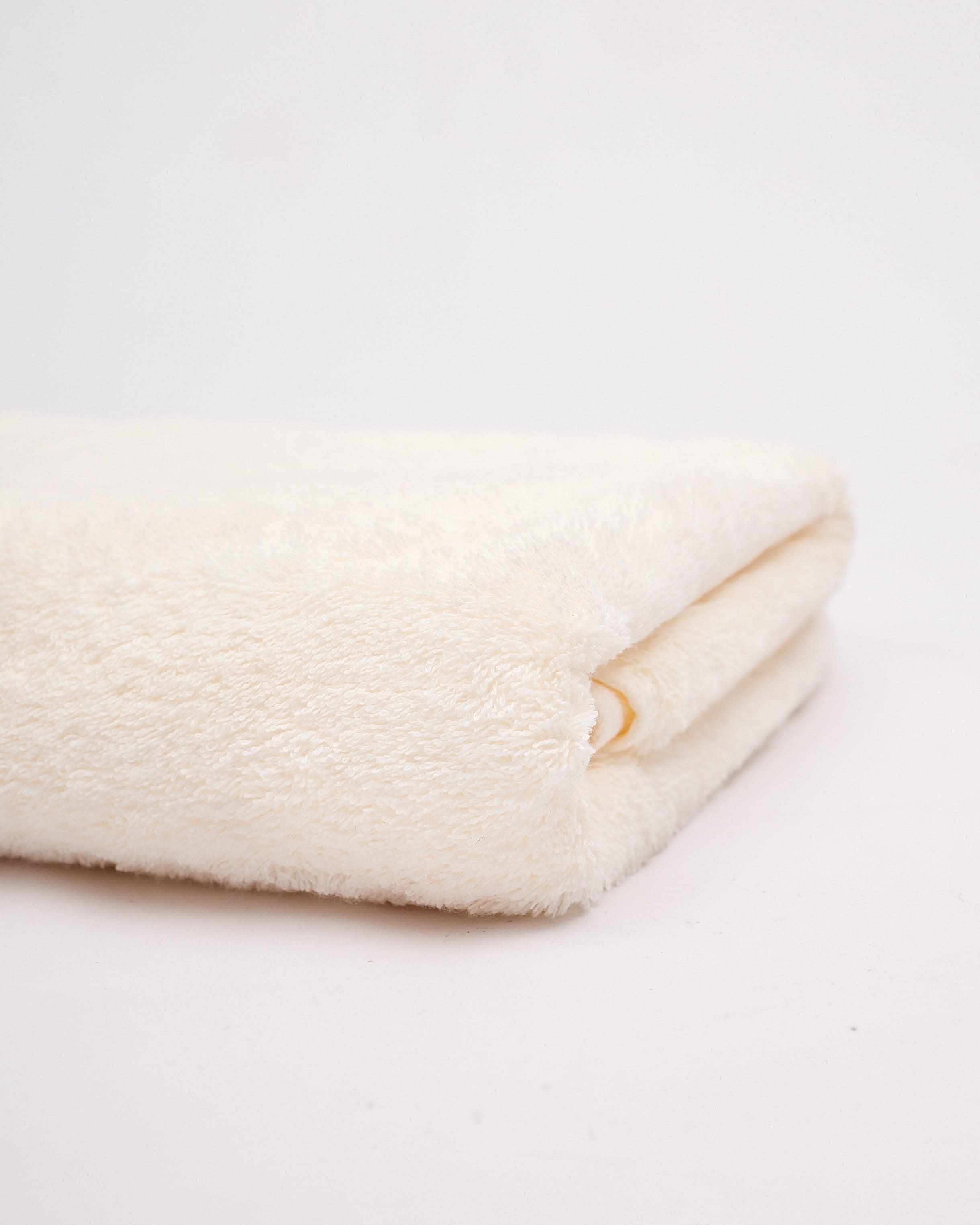 Deluxe Bath Sheet made from 100% cotton, folded on a neutral background.