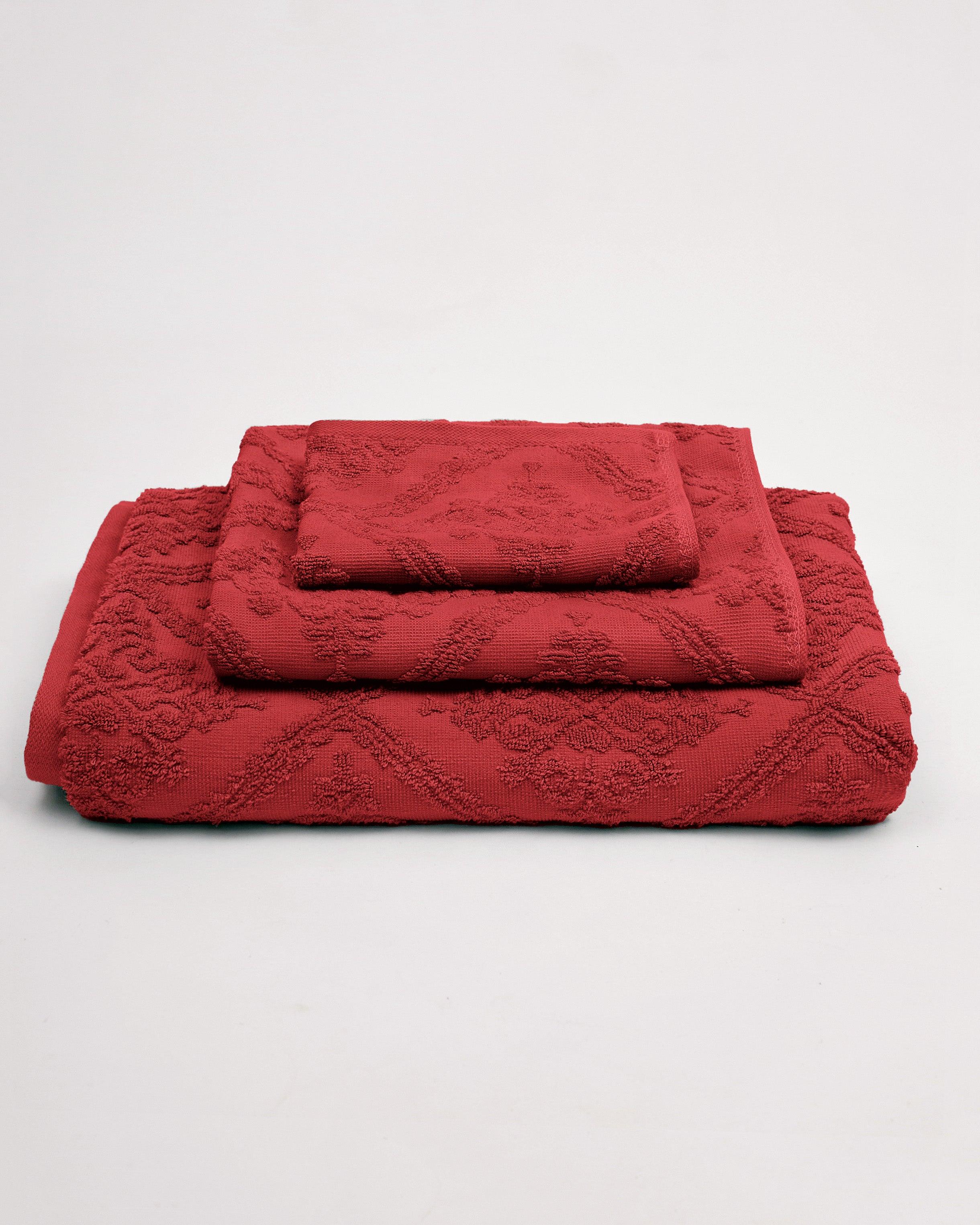 Karis Towel Collection with luxurious jacquard design in red.