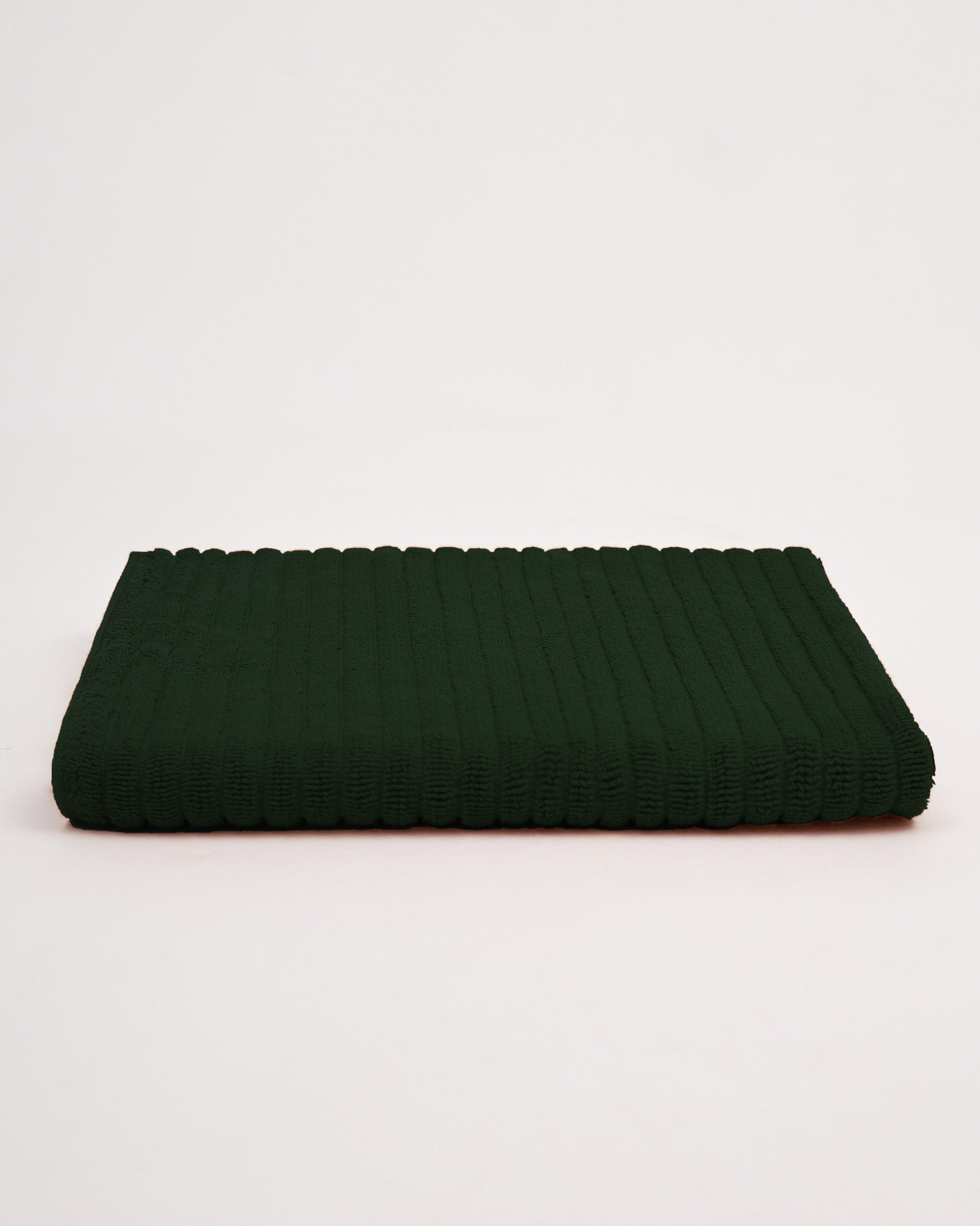 Linea Towel Collection in dark green color.