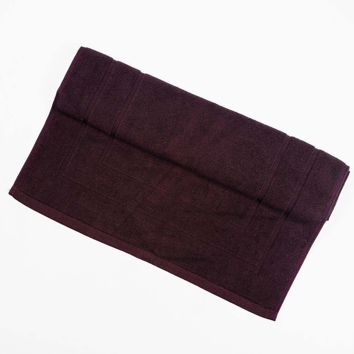 Plush deluxe bath mat in dark color, absorbent and available in 15 colors.