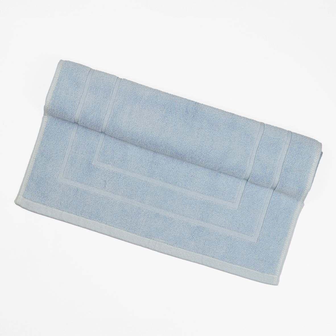 Light blue deluxe bath mat with plush design, offering superior comfort and water absorption.