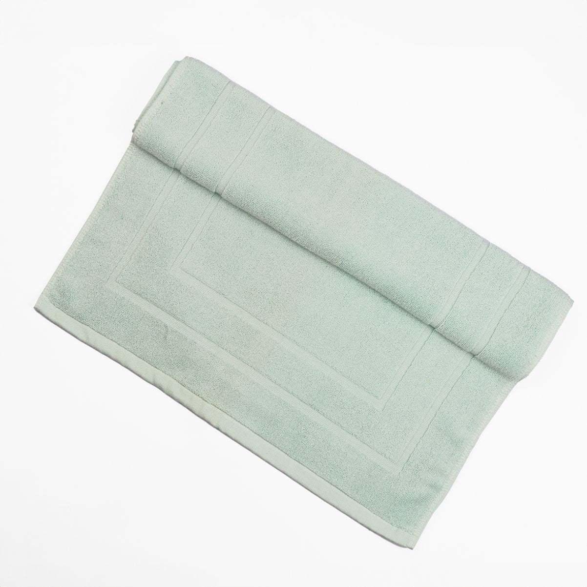 Luxury mint green deluxe bath mat for ultimate bath-time comfort.