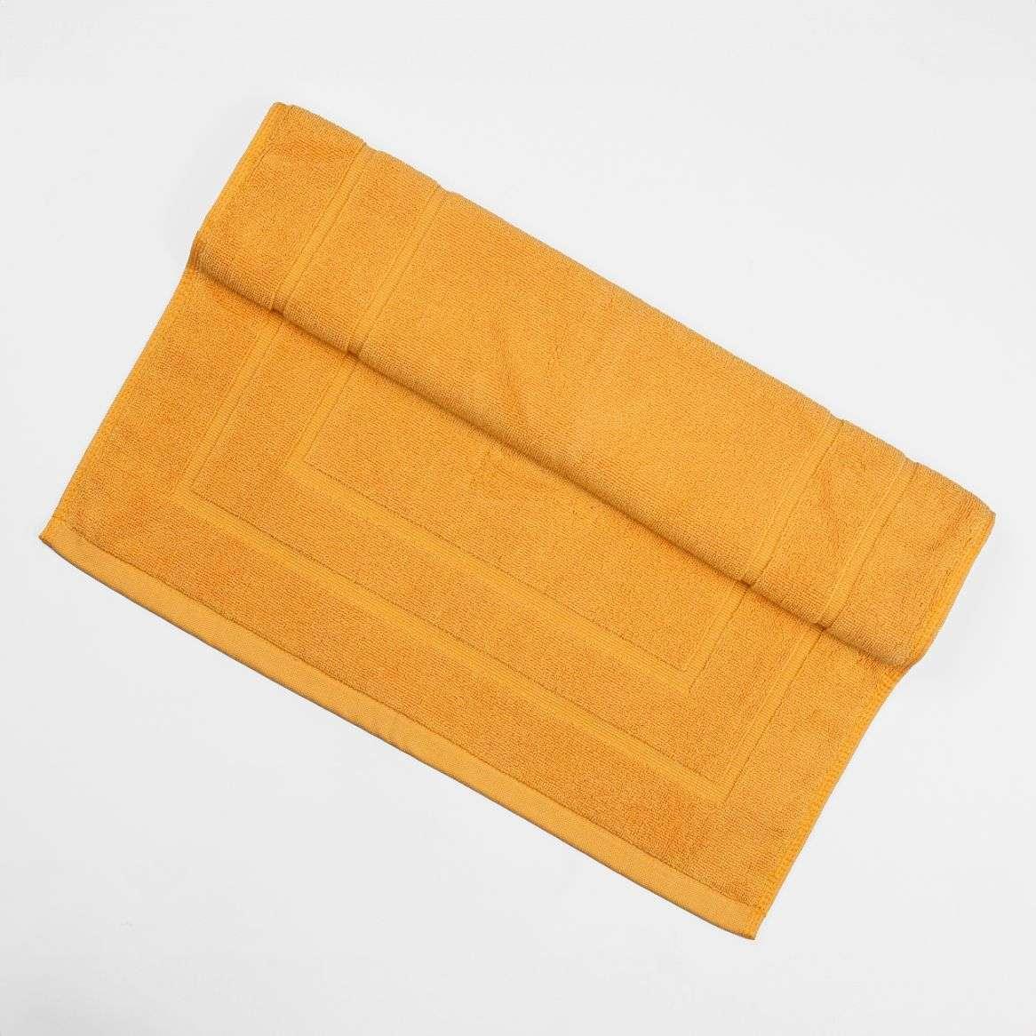 Deluxe Bath Mat in plush golden yellow, soft and absorbent.