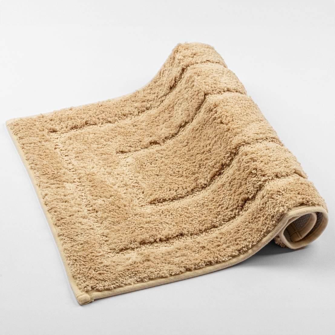 Ola Bath Rug with anti-slip design in beige color.