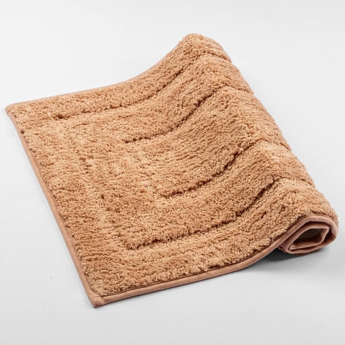 Ola Bath Rug with anti-slip design in a stylish, textured pattern.