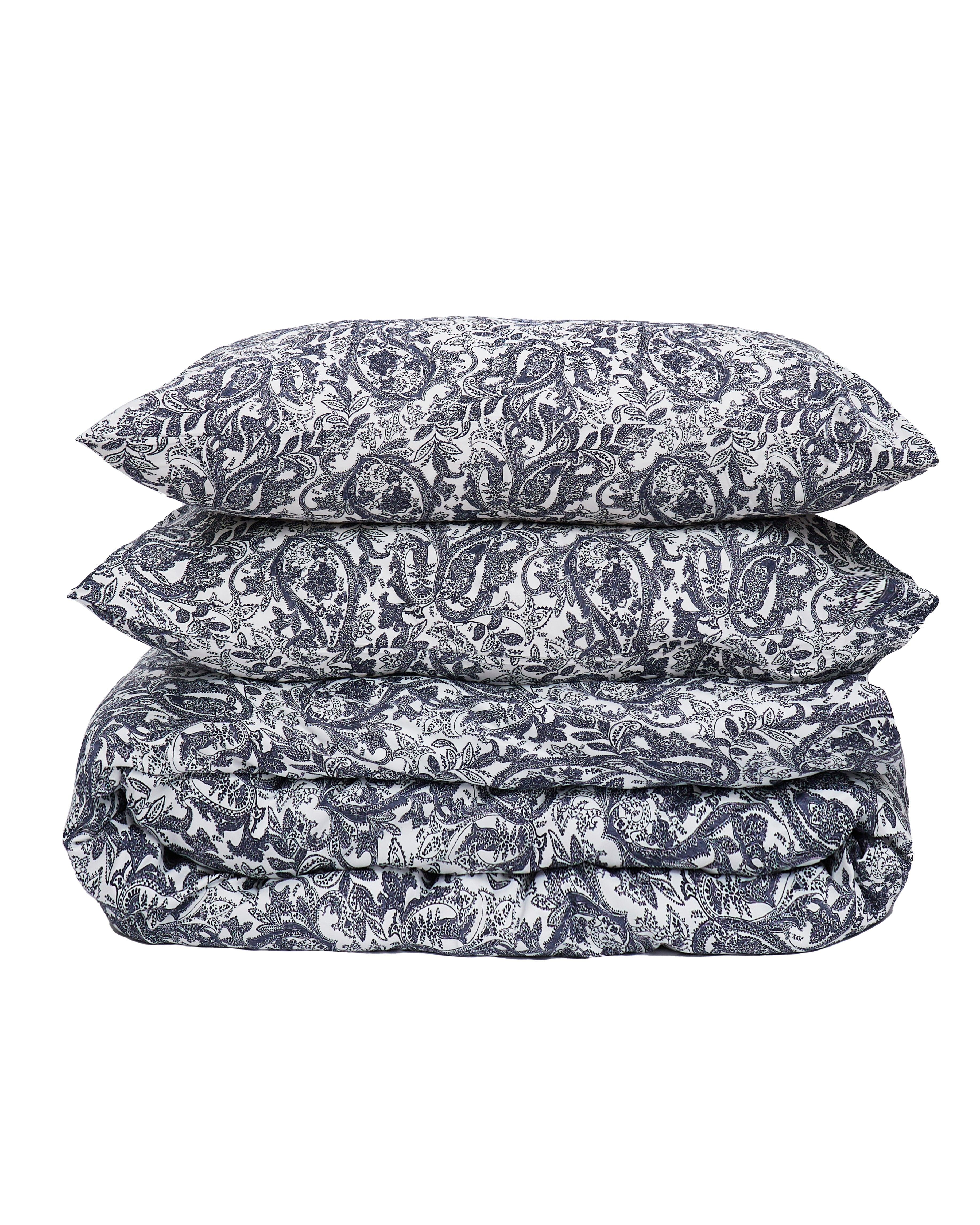 Limited edition print duvet cover set with intricate dark blue and white pattern