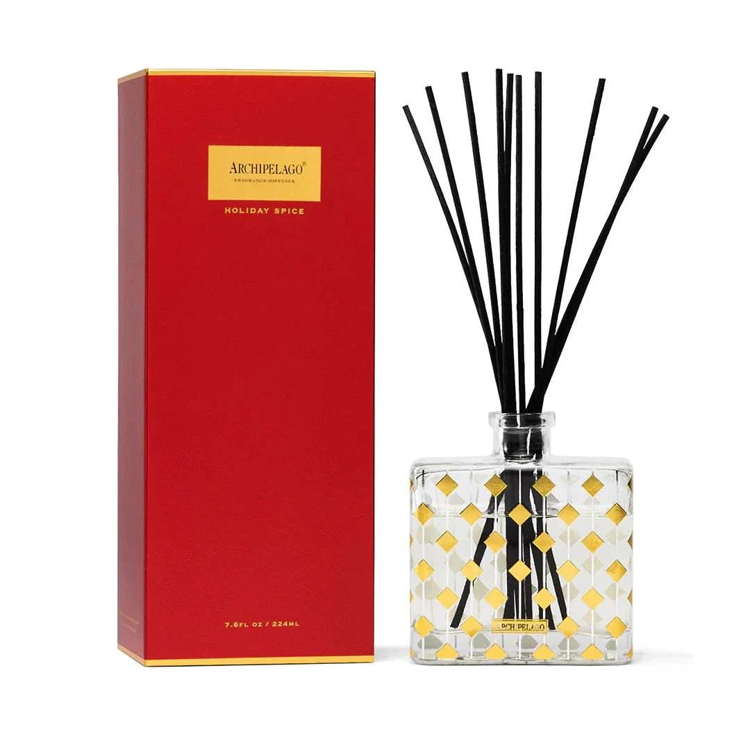 Archipelago Holiday Spice Diffuser with decorative reeds and elegant packaging.