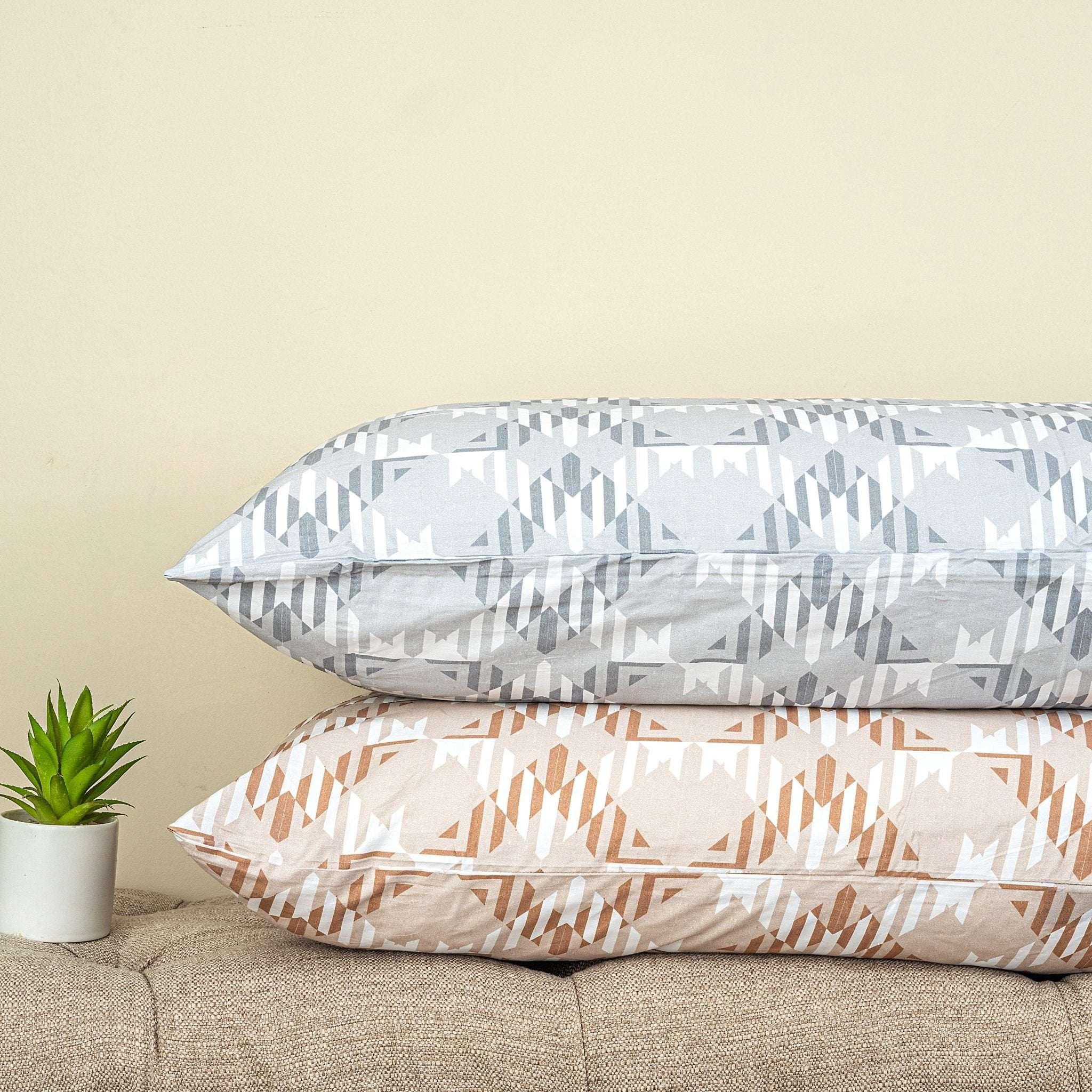 Diamanté duvet cover set with classic cut diamond design in brown and grey colors on pillows
