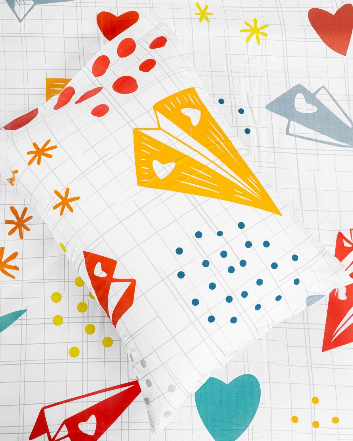 Origami kids duvet cover set featuring colorful origami cranes, hearts, stars, and circles on a white background.